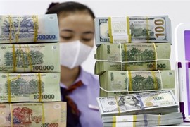 Ngân hàng phải ‘chữa bệnh thừa tiền’