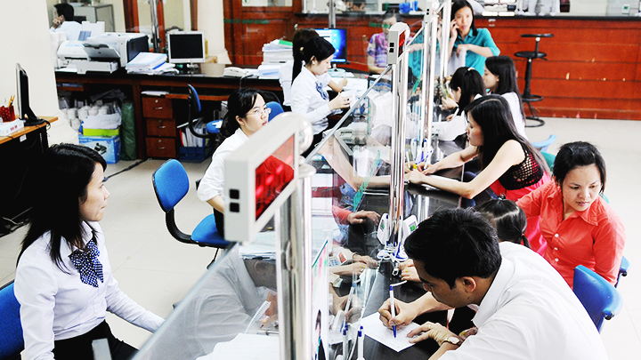 Ngân hàng vẫn “ép” khách vay mua bảo hiểm