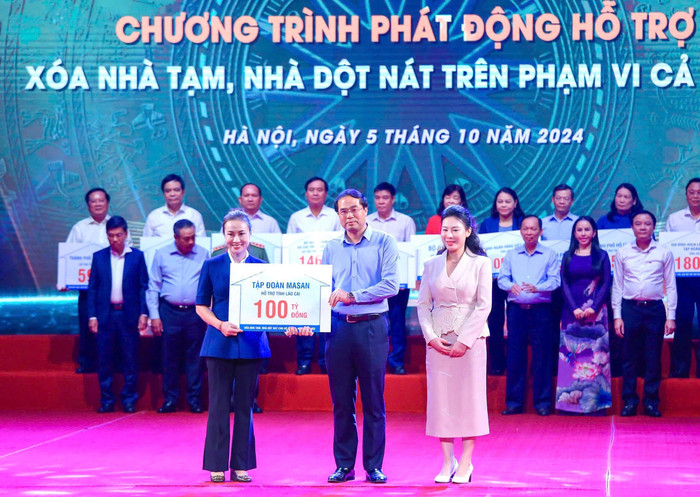 Masan Group trao 100 ty ho tro chuong trinh "Mai am cho dong bao toi" Tập đoàn Masan đóng góp 100 tỷ hỗ trợ người dân tỉnh Lào Cai