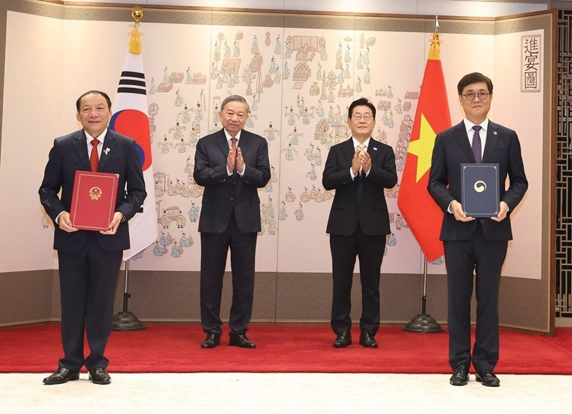vna-potal-tong-bi-thu-to-lam-va-tong-thong-han-quoc-chung-kien-le-trao-cac-van-kien-hop-tac-giua-hai-nuoc-8202813.jpg