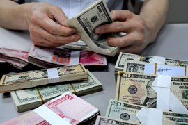 IMF: Vị thế thống trị của đồng USD đang dần suy yếu